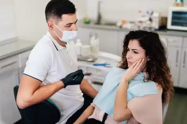 patient receiving care from emergency dentist in Allen