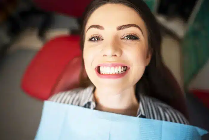 Smiling patient after receiving dental sealants in Allen
