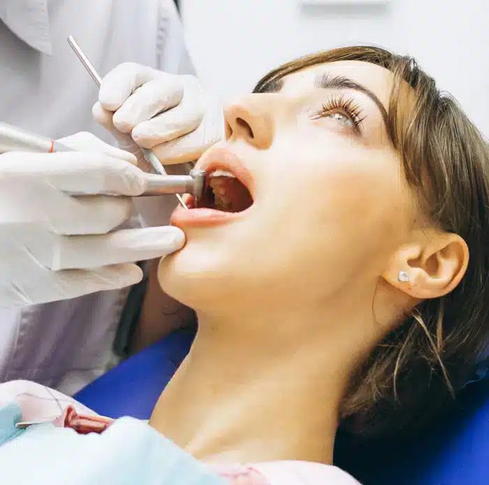 Patient undergoing root canal treatment in Allen