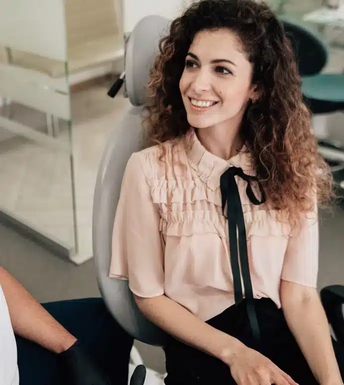 Female patient smiling after general dentistry in Allen